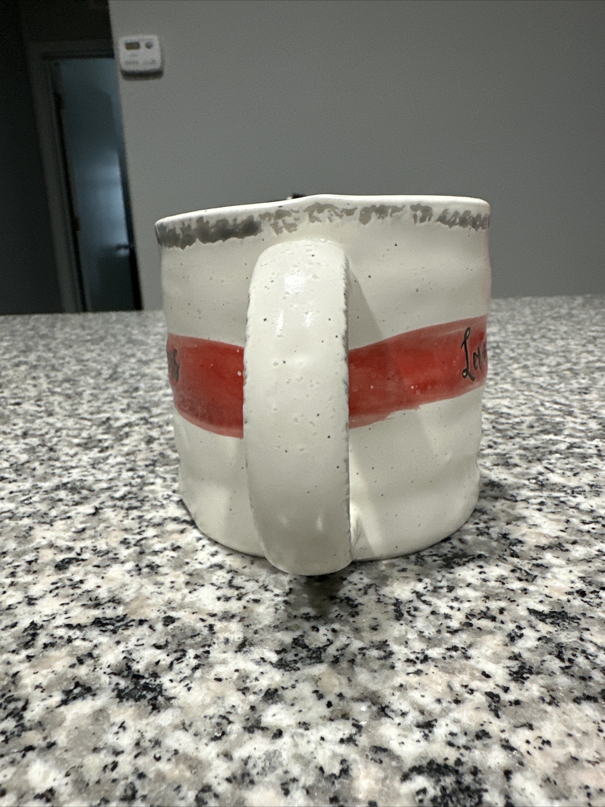 LOVE OTHERS COFFEE MUG. EMBOSSED LOVE OTHERS.