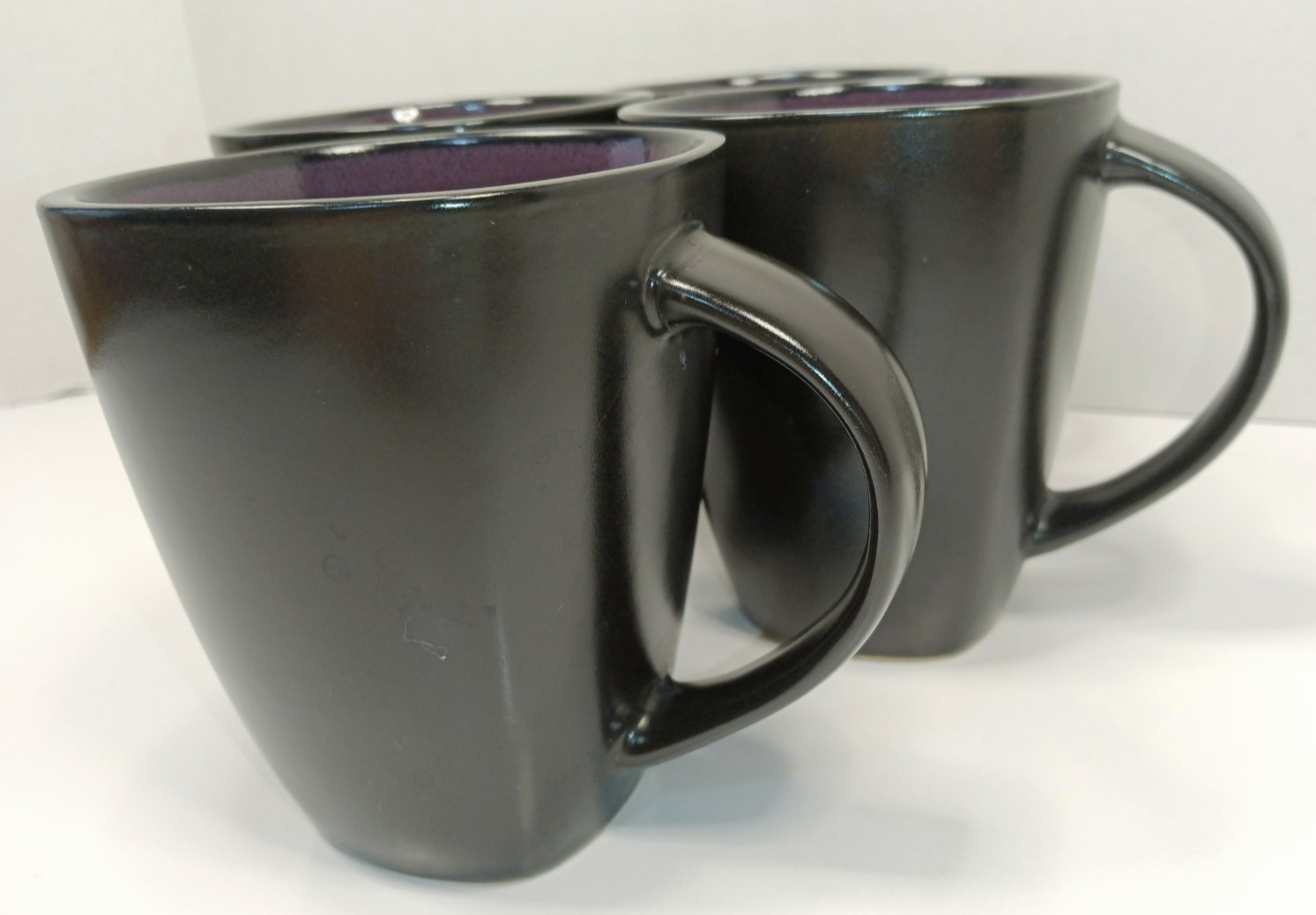 Gibson Elite Mugs Black with Purple Interior Square Base/Round on top Set of 4