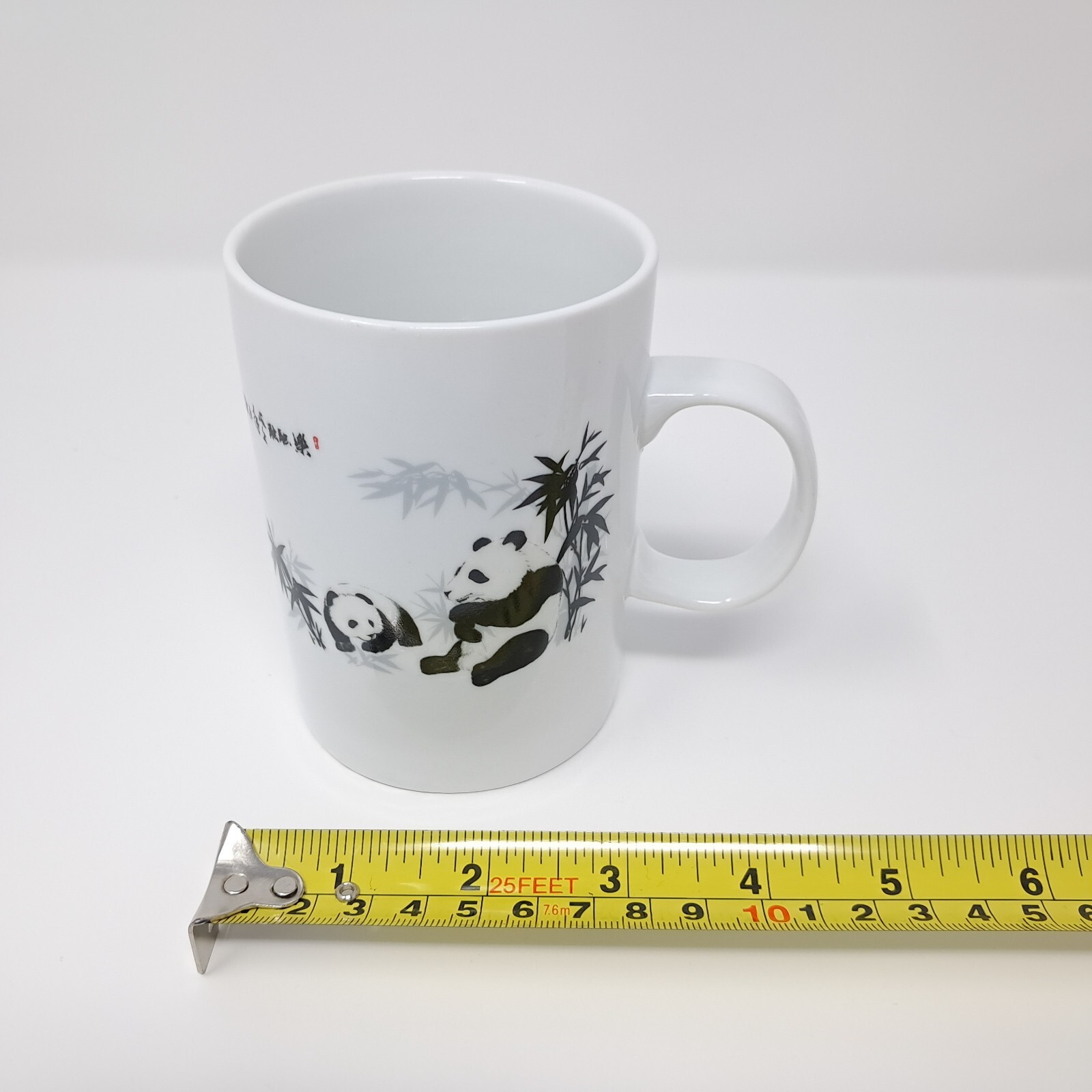 Panda Coffee Mug White Ceramic Cup embossed CFI 12 fluid ounces