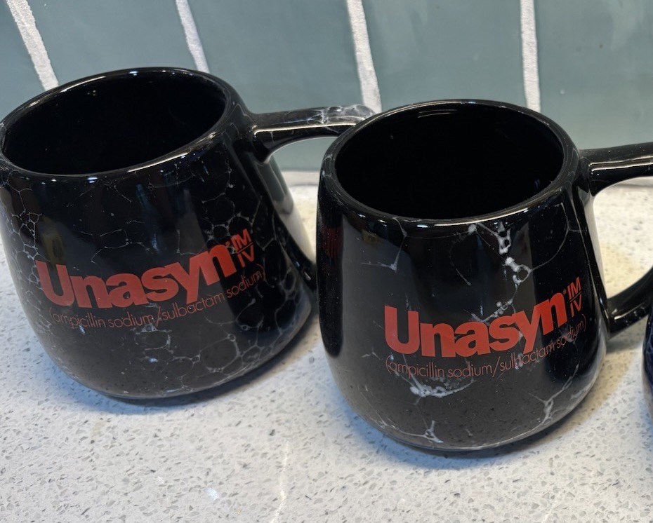 Unasyn Lot – Black Marble Ceramic Coffee Mugs (2) – White Plastic Bins (5)