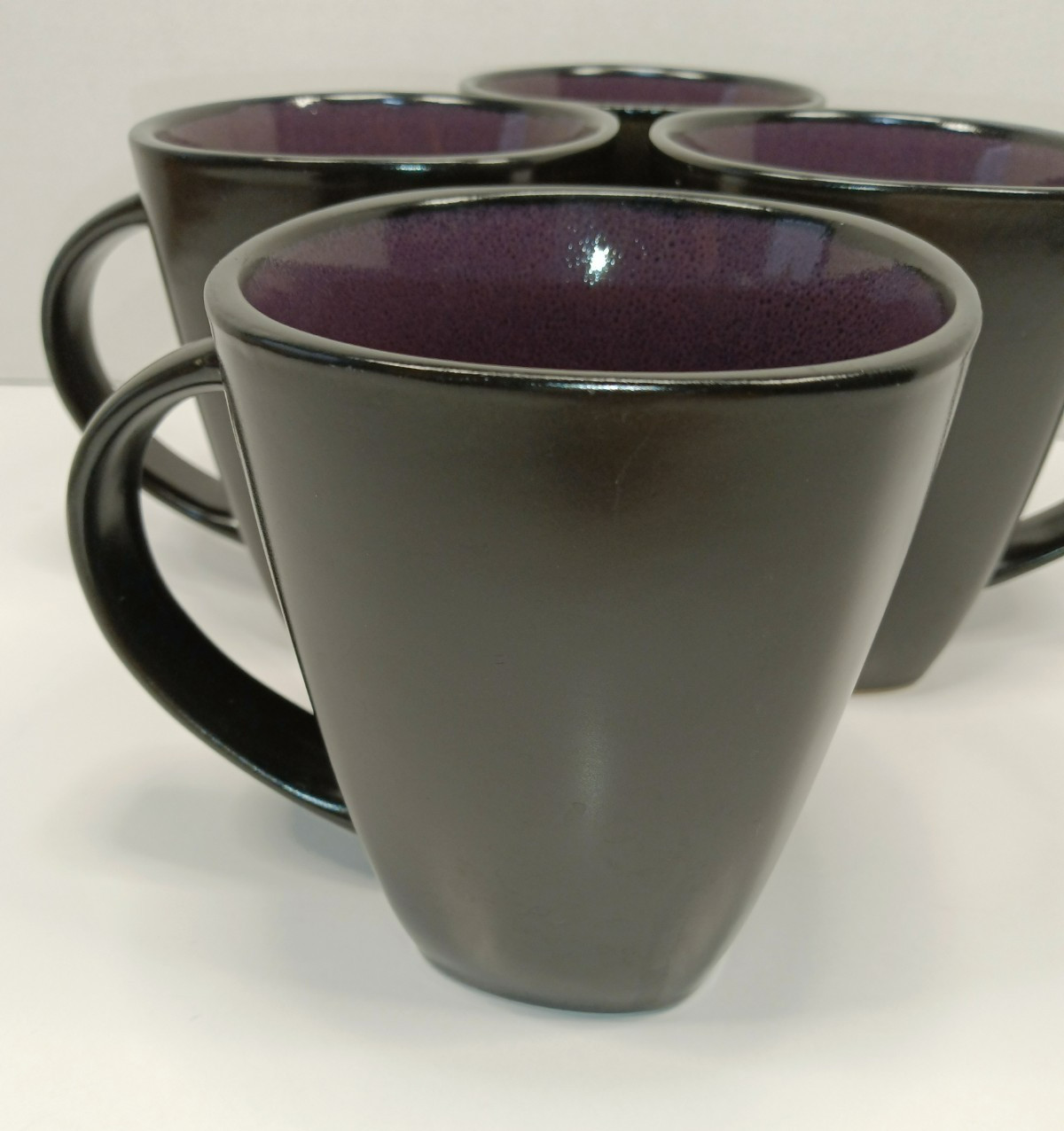 Gibson Elite Mugs Black with Purple Interior Square Base/Round on top Set of 4