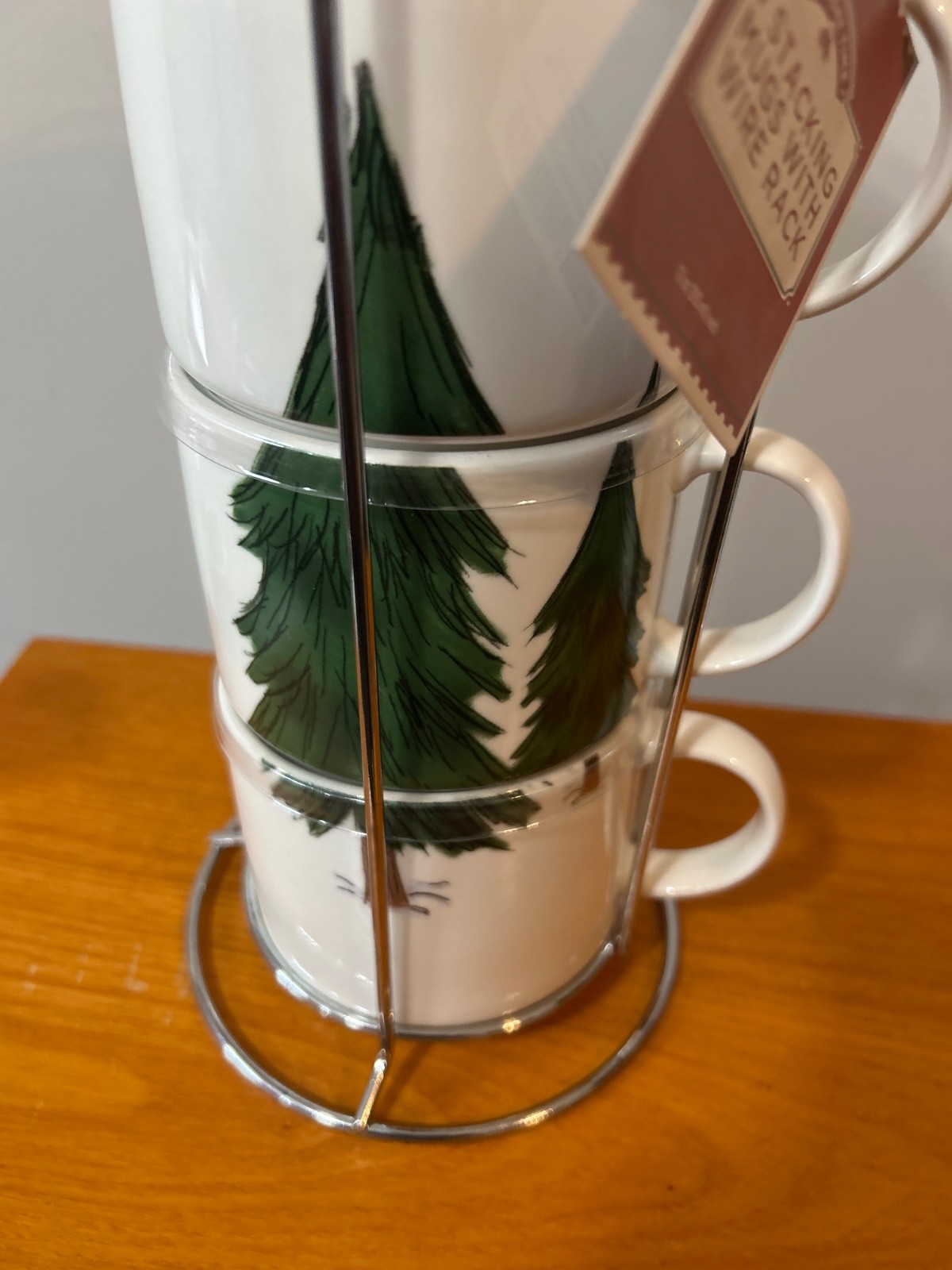 Holiday Time 4-piece stacking mug set includes a metal wire rack for storage.