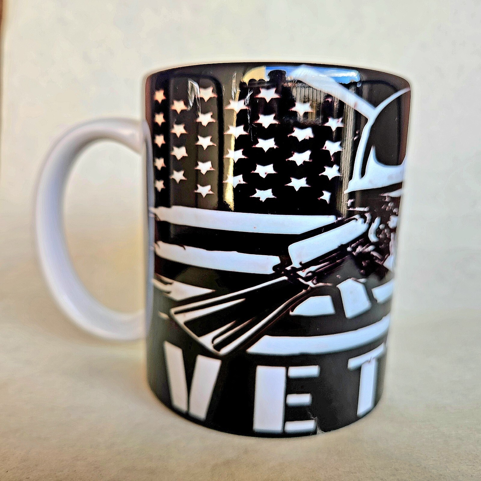 Handmade Skull and American flag with two M16 rifles across. Veterans respect