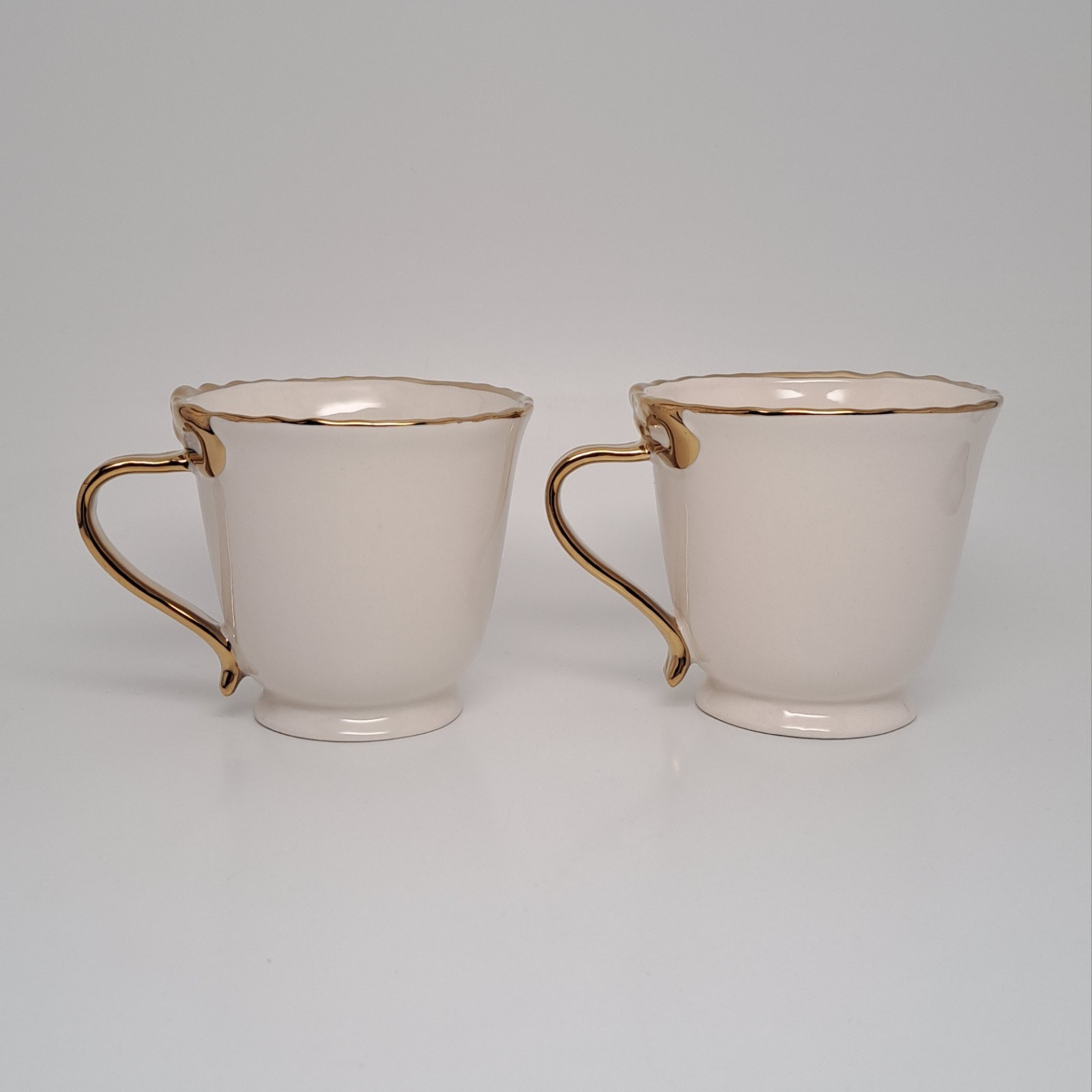 Set Of 2 Anthropologie Benedita Bow Gold Stoneware Coffee Mugs 11.5 oz