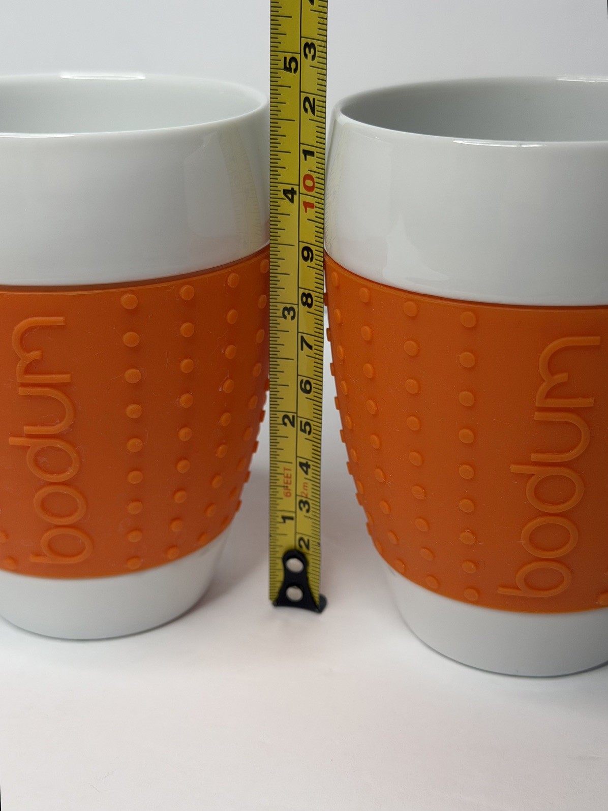 BODUM Set of 2 – Pavina 12oz Porcelain Cup Mugs orange Dotted Silicone Grip 4.5″