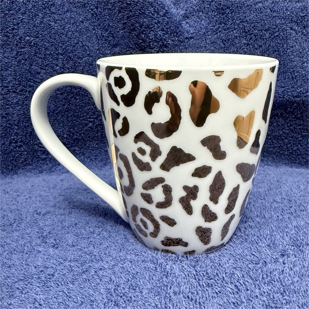 Brand new Vintage Pier 1 Leopard Animal Print Ceramic Coffee Mugs Set of 2