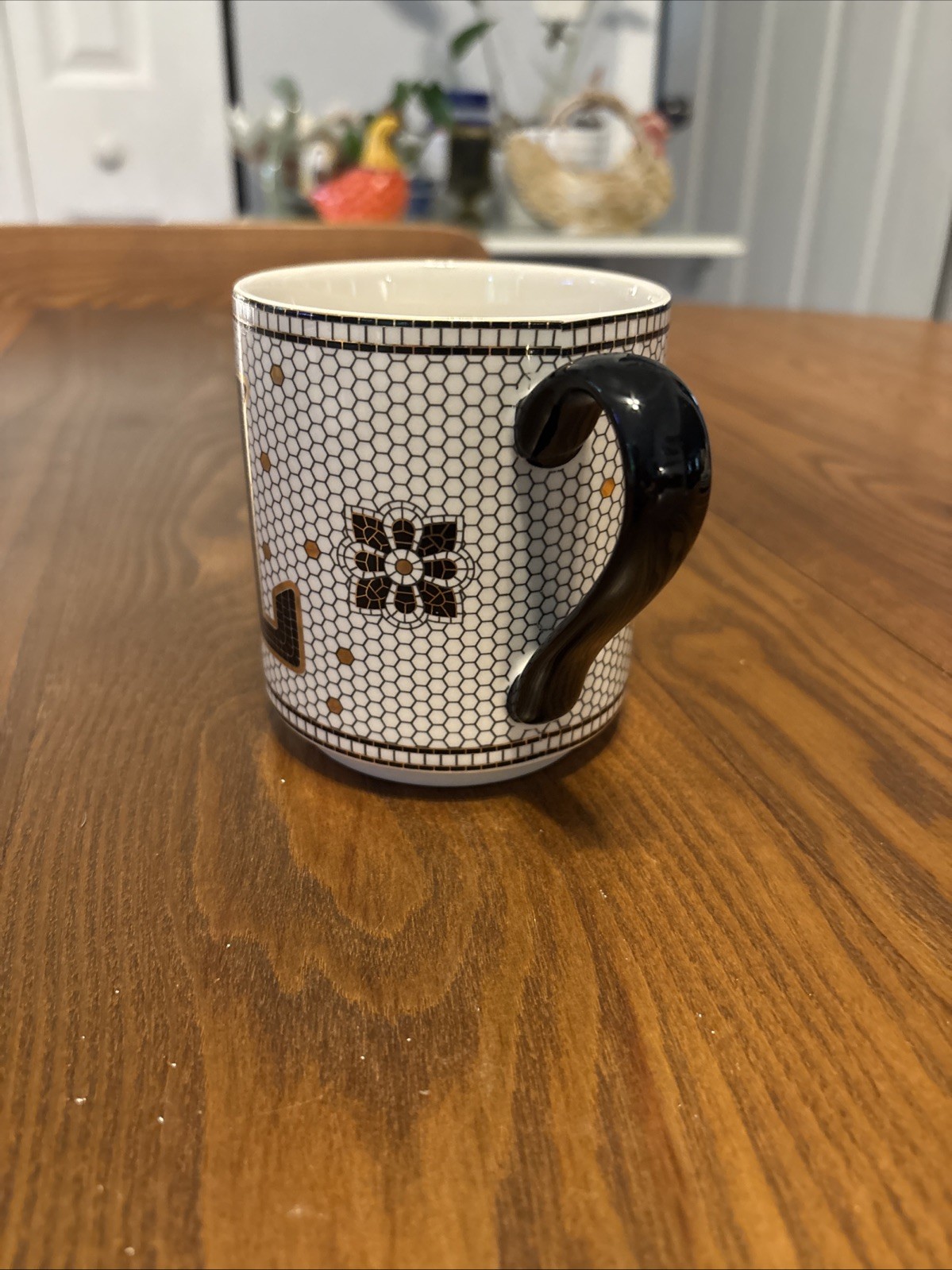Anthropologie Bistro Tile Margot Mug featuring the letter “L”