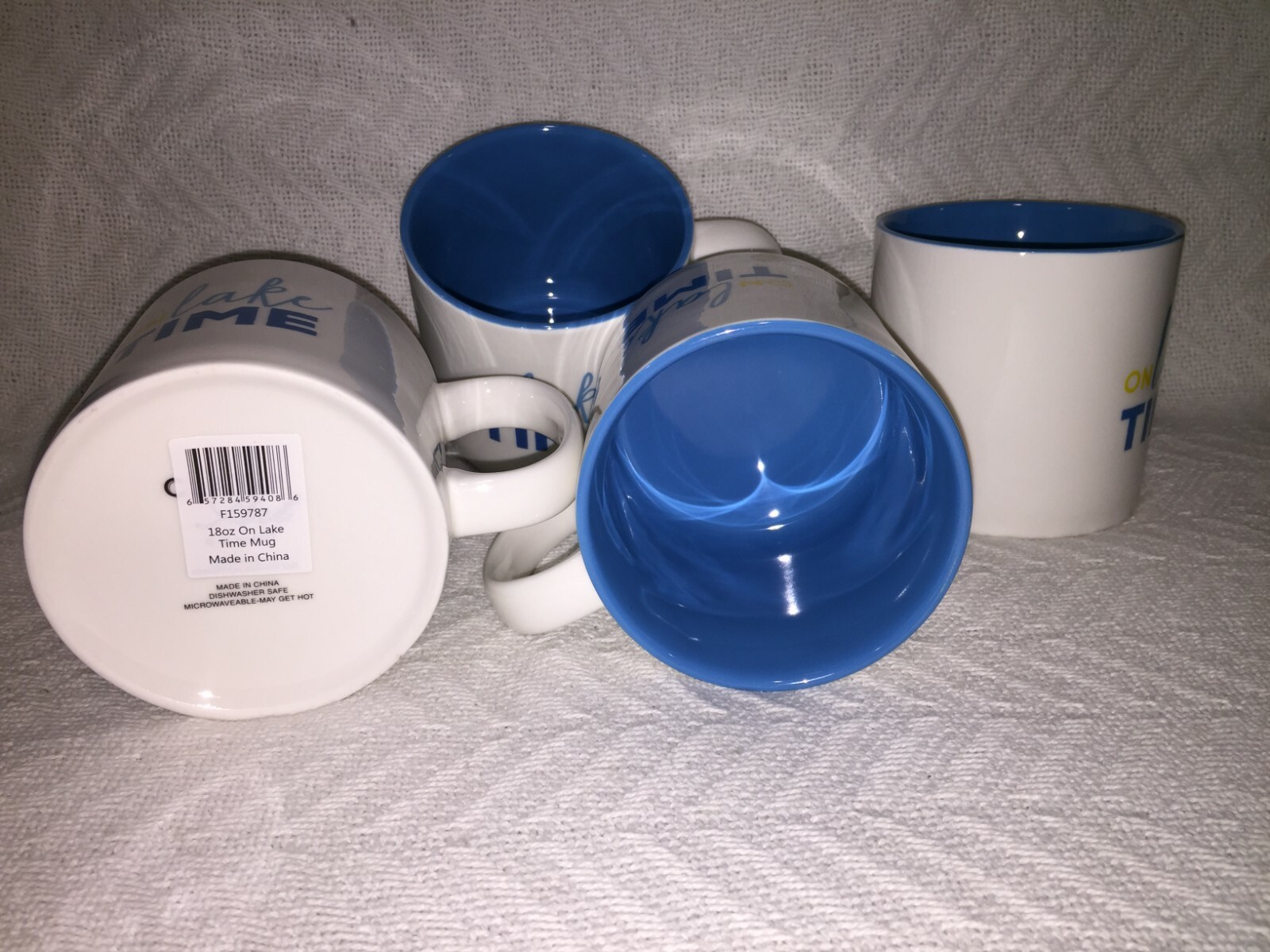 Set of 4 Clay Art 18 oz “On Lake Time” White and Blue Handle Coffee Mugs F159787