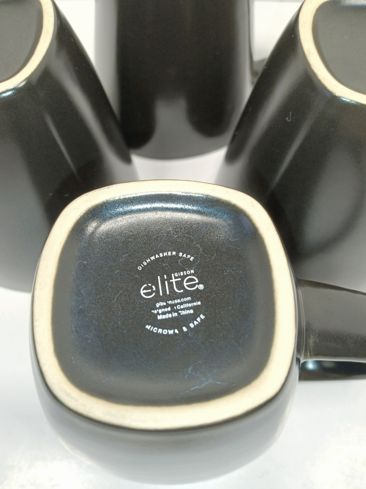 Gibson Elite Mugs Black with Purple Interior Square Base/Round on top Set of 4