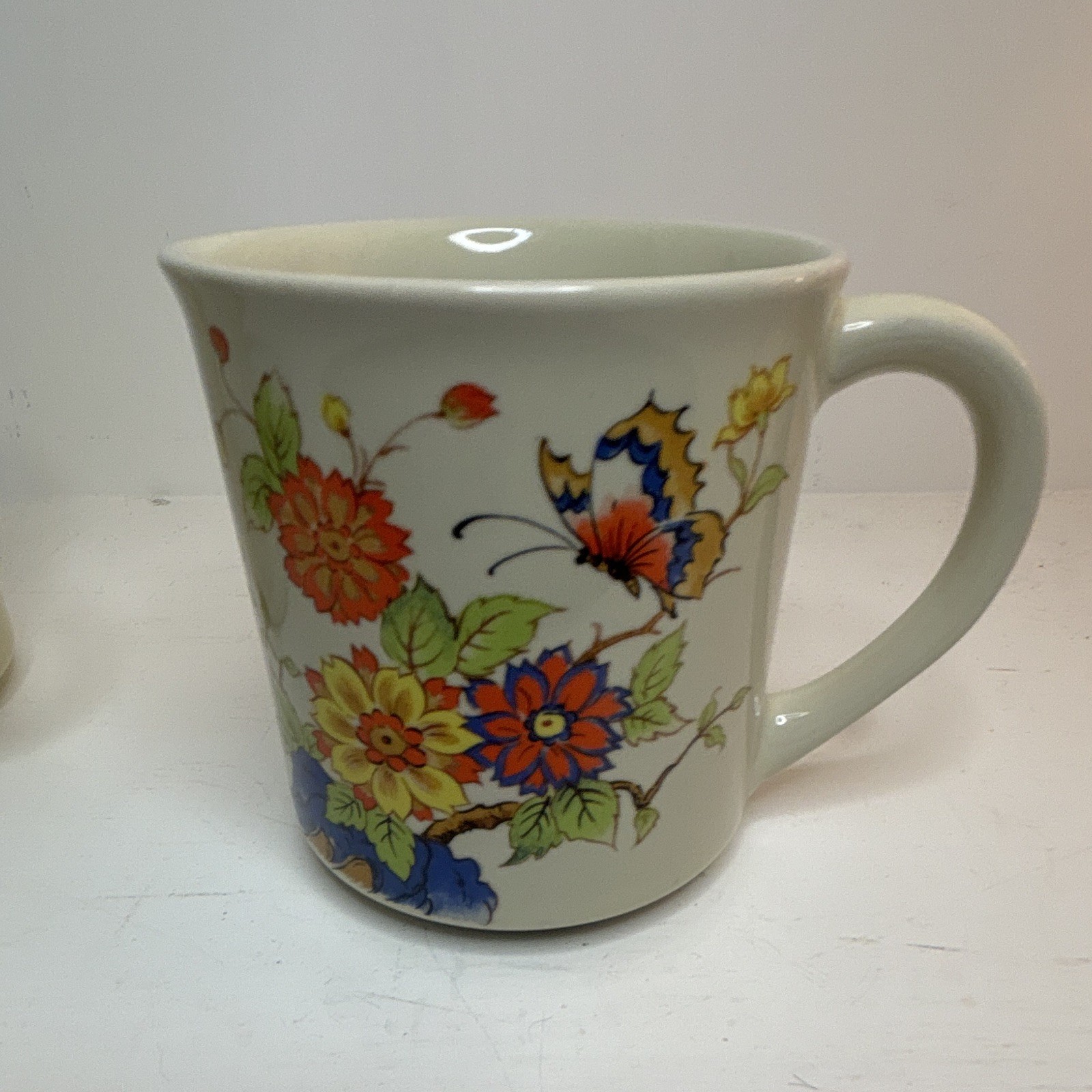 Set of (2) 70’s Vintage Ceramic Coffee Mugs 8 fl oz Floral Butterfly (cream)