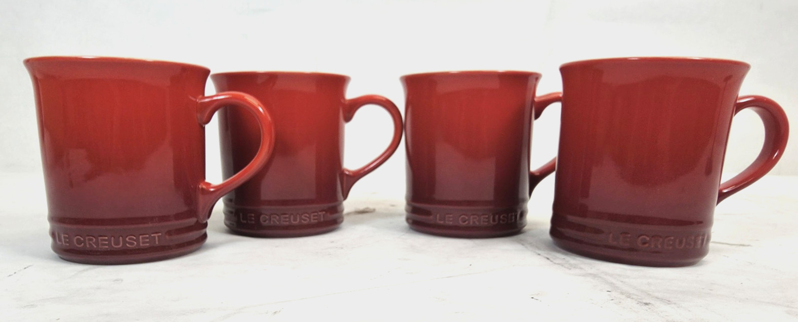 Le Creuset Stoneware 4 Mugs, 14oz (ea) Cerise color with generic stand holder