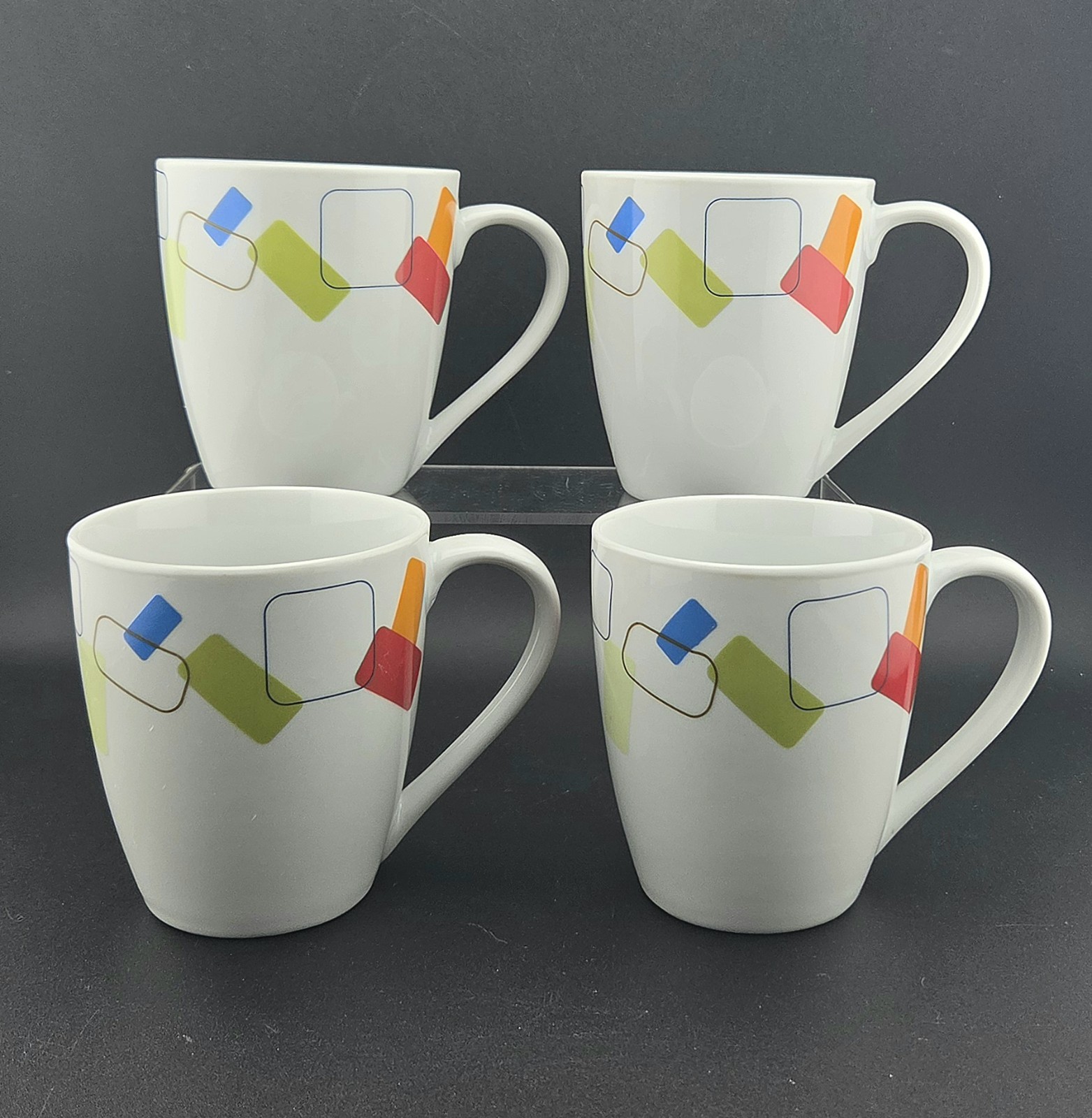 SET (4) “SOHO” Mugs Tabletops Gallery Unlimited Multicolored 3-7/8″ Tall 12 oz